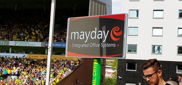 Mayday Sponsors Matchday Team Sheets & Advertises at Carrow Road